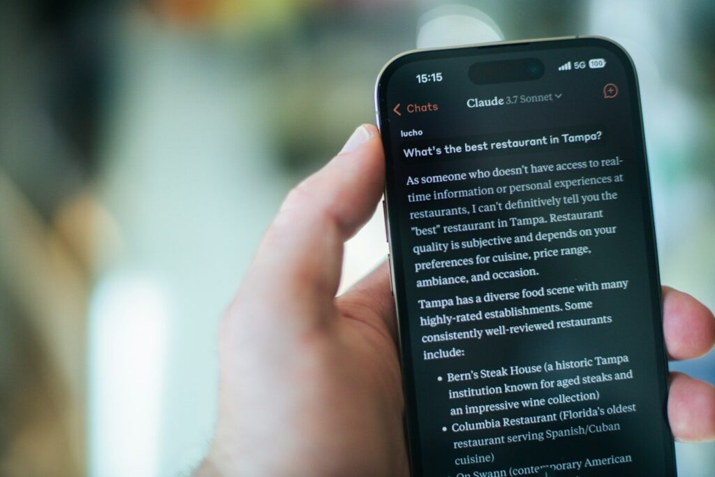 A person reads restaurant recommendations on their phone